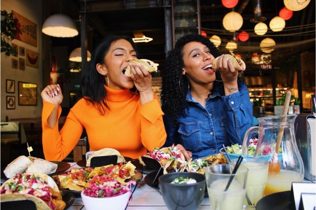 Two friends having a great time dftacos_london_mexicanrestaurant